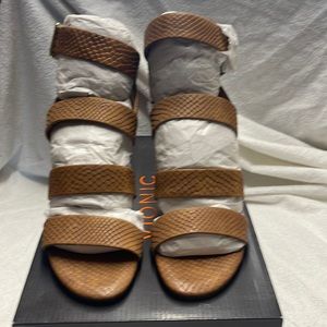 Vionic boots NIB never worn. Smoke free house. Snake brown